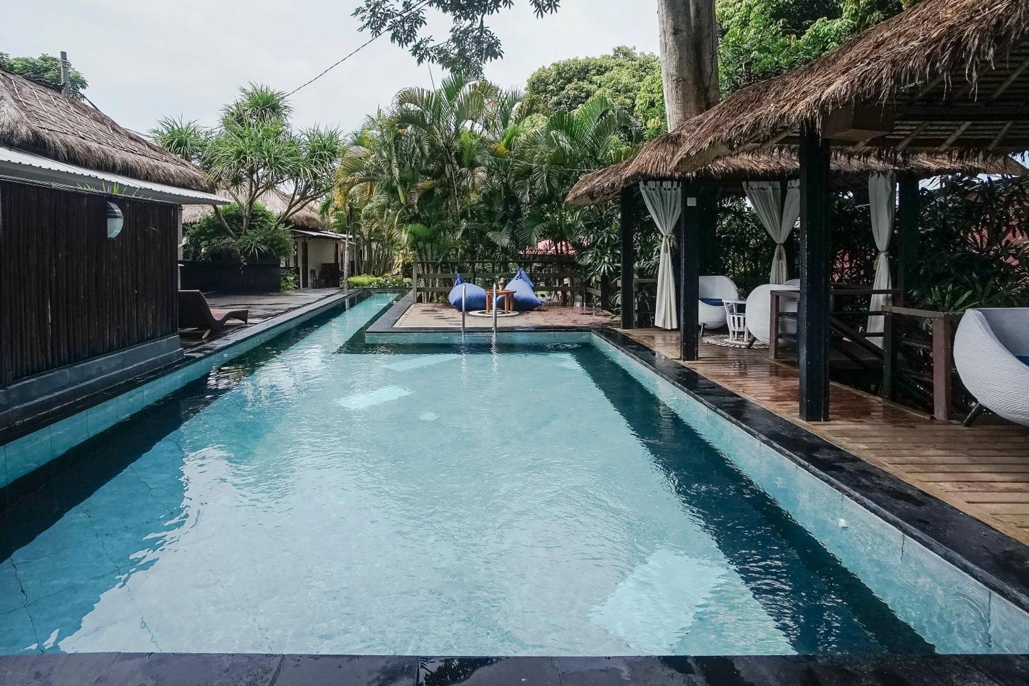 Отель Kampung 168 Джимбаран Экстерьер фото